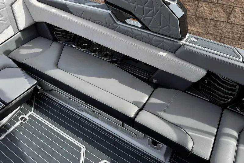 Slide: The Image of Luxurious seating in 2022 Nautique Super Air Nautique G25 Paragon boat interior. - 35