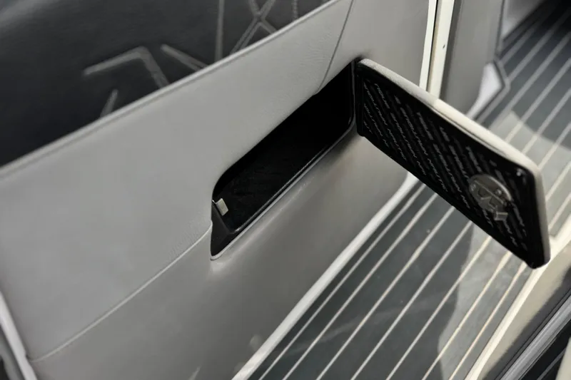 Slide: The Image of Interior storage compartment of 2022 Nautique Super Air Nautique G25 Paragon boat. - 47
