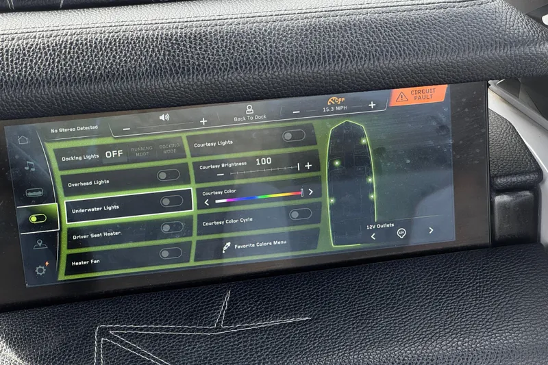 Slide: The Image of Touchscreen control panel in a 2022 Nautique Super Air Nautique G25 Paragon boat. - 53