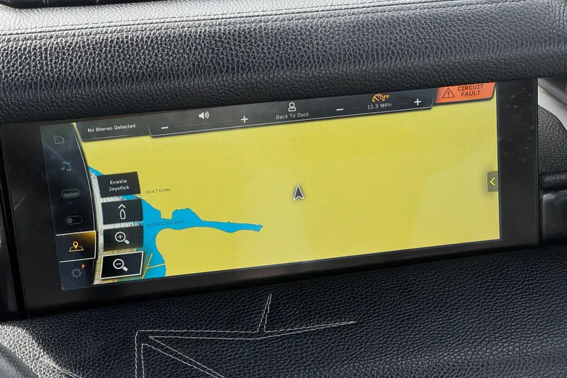 Slide: The Image of Dashboard display of 2022 Nautique Super Air Nautique G25 Paragon with navigation map. - 54