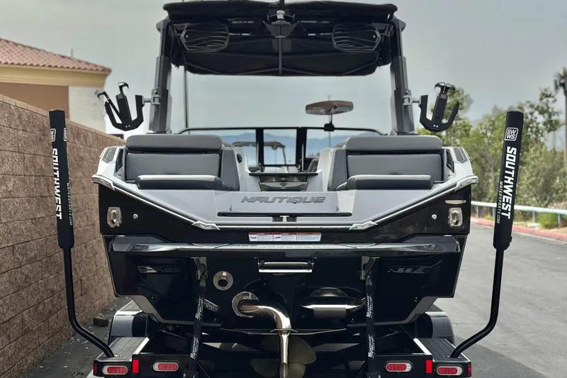 Slide: The Image of 2022 Nautique Super Air Nautique G25 Paragon boat on trailer, rear view. - 6