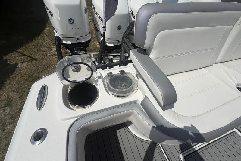 Slide: The Image of 2018 Nor-Tech 452 Super Fish boat interior with dual engines and seating area. - 10
