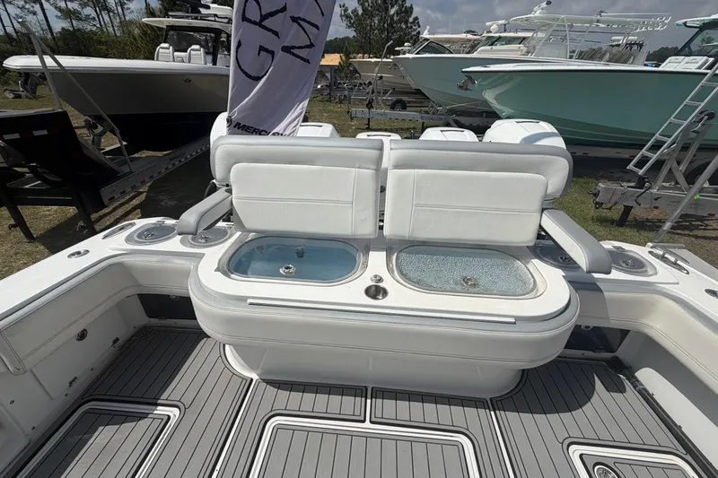 Slide: The Image of 2018 Nor-Tech 452 Super Fish boat interior with seating and live wells. - 12