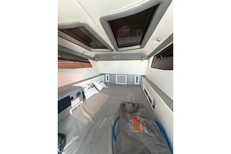 Slide: The Image of Interior cabin of 2018 Nor-Tech 452 Super Fish boat, featuring modern design and amenities. - 18