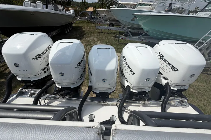 Slide: The Image of Five powerful outboard engines on a 2018 Nor-Tech 452 Super Fish boat. - 30