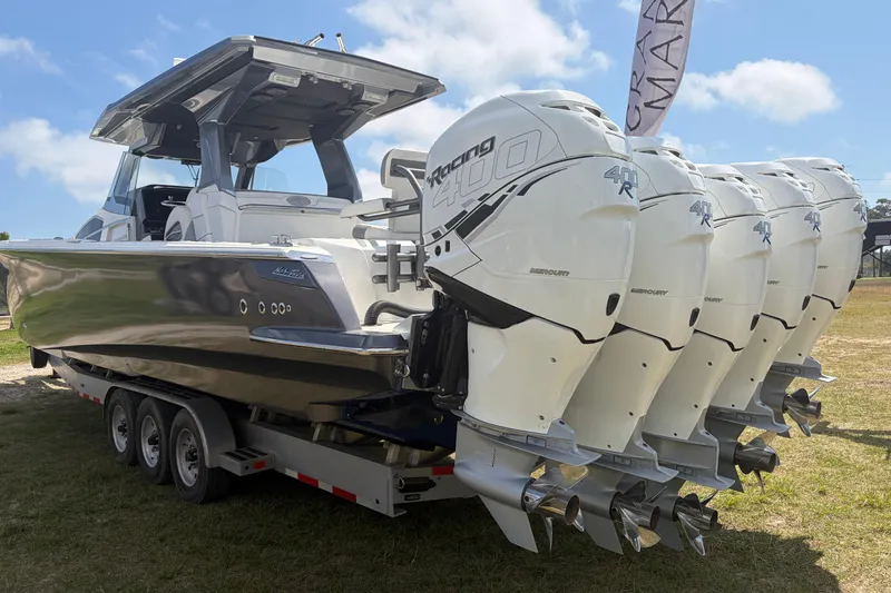 Slide: The Image of 2018 Nor-Tech 452 Super Fish boat with multiple powerful outboard engines on display. - 7