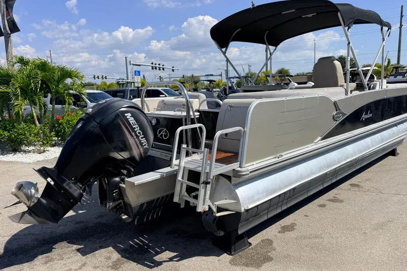 Slide: The Image of 2014 Avalon 2485 Catalina Entertainer Tri Toon boat with Mercury outboard motor. - 6