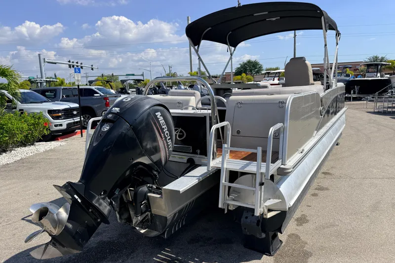 Slide: The Image of 2014 Avalon 2485 Catalina Entertainer Tri Toon boat with Mercury outboard motor. - 7