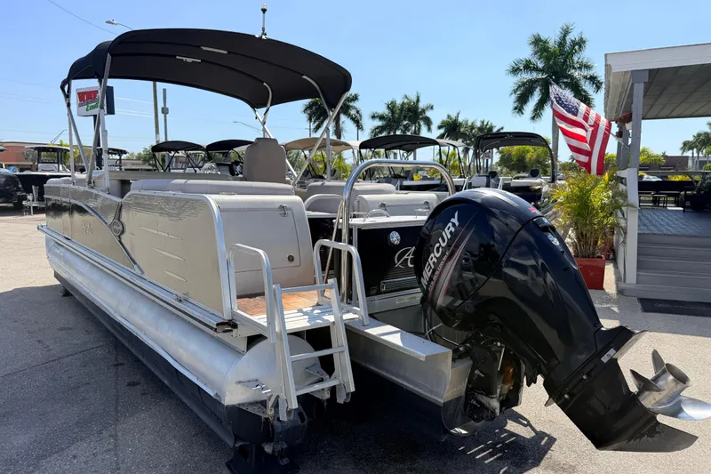 Slide: The Image of 2014 Avalon 2485 Catalina Entertainer Tri Toon boat with Mercury outboard motor. - 9