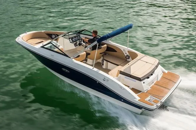 Slide: The Image of Manufacturer Provided Image: 2020 Sea Ray SPX 210 boat cruising on water. - 3