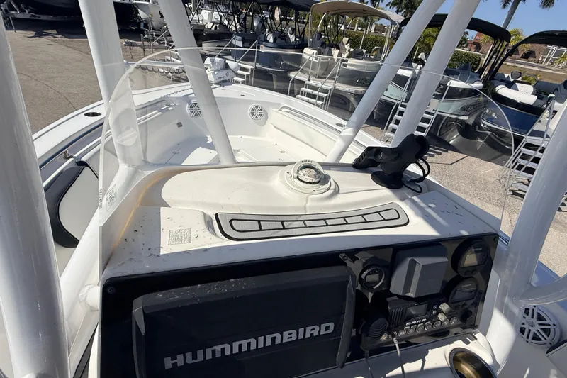 Slide: The Image of 2021 Tidewater 210 LXF boat dashboard with Humminbird electronics and compass. - 20