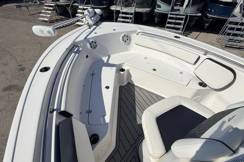 Slide: The Image of 2021 Tidewater 210 LXF boat interior with seating and deck details. - 21