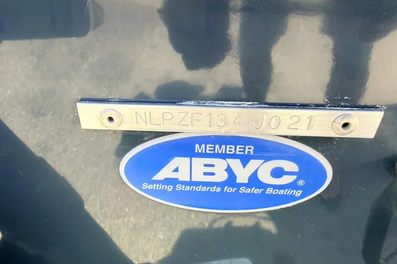 Slide: The Image of 2021 Tidewater 210 LXF boat with ABYC member plaque and serial number. - 25