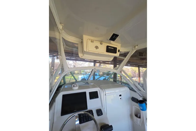 Slide: The Image of Garmin GPS display on 2022 Sailfish 220 WAC boat dashboard. - 15