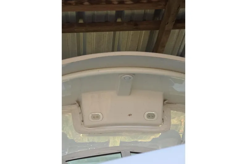 Slide: The Image of 2022 Sailfish 220 WAC boat interior ceiling with light fixtures. - 21