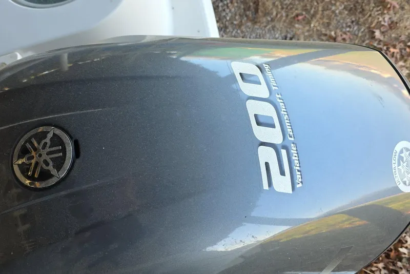 Slide: The Image of Yamaha display showing trip data: 68.7 gallons used, 199.6 miles traveled. Sailfish 220 WAC 2022. - 23