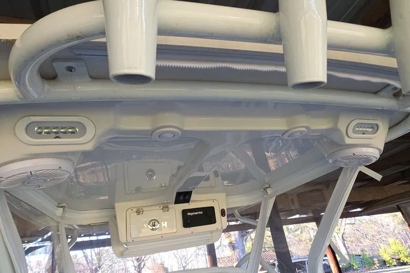 Slide: The Image of White speaker on 2022 Sailfish 220 WAC boat interior. - 32