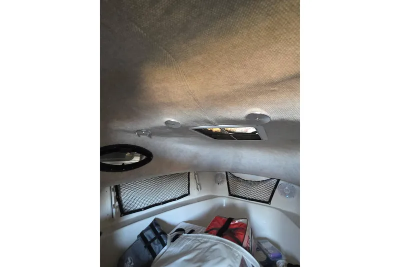 Slide: The Image of 2022 Sailfish 220 WAC dashboard with Garmin and Yamaha displays. - 33