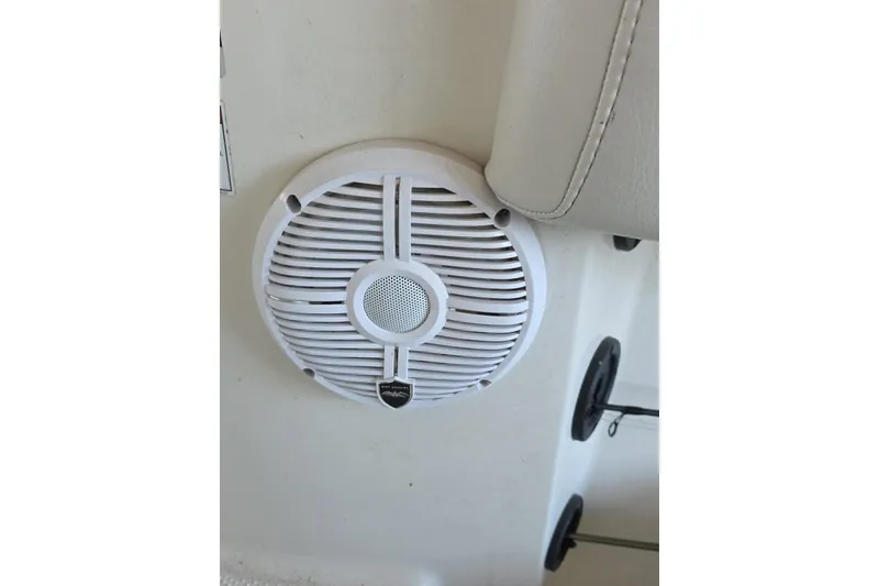 Slide: The Image of Close-up of a 2022 Sailfish 220 WAC trailer wheel on gravel. - 38