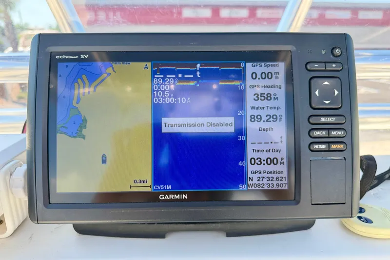 Slide: The Image of Garmin GPS display on 2001 Sea Fox 215 Bay Fisher, showing navigation and water temperature. - 14