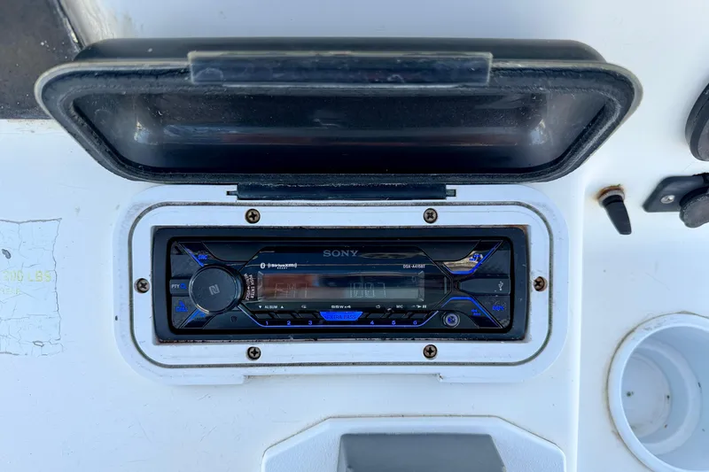 Slide: The Image of Sony stereo system on a 2001 Sea Fox 215 Bay Fisher boat dashboard. - 17