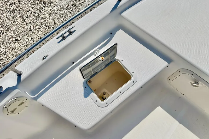 Slide: The Image of Open storage compartment on 2001 Sea Fox 215 Bay Fisher boat deck. - 24