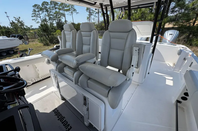 Slide: The Image of 2019 Everglades 435 Center Console boat with luxurious seating and modern design. - 27