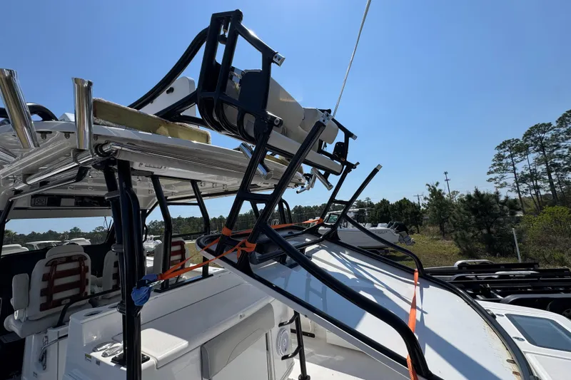 Slide: The Image of 2019 Everglades 435 Center Console boat with advanced fishing equipment and seating. - 39