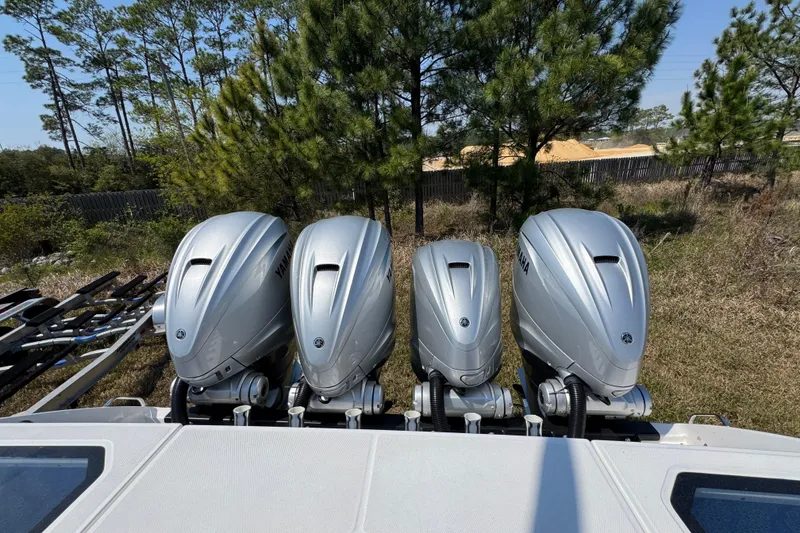 Slide: The Image of Four Yamaha outboard motors on a 2019 Everglades 435 Center Console boat. - 44