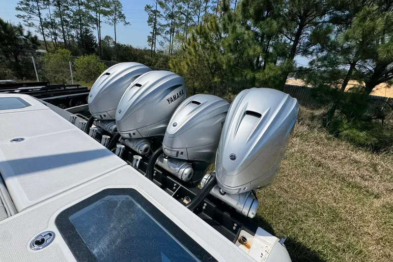 Slide: The Image of Four Yamaha outboard engines on a 2019 Everglades 435 Center Console boat. - 45