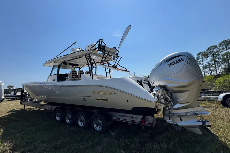 Slide: The Image of 2019 Everglades 435 Center Console boat with Yamaha engines on a trailer. - 7