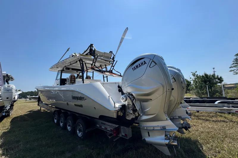 Slide: The Image of 2019 Everglades 435 Center Console boat with Yamaha engines on a trailer. - 8