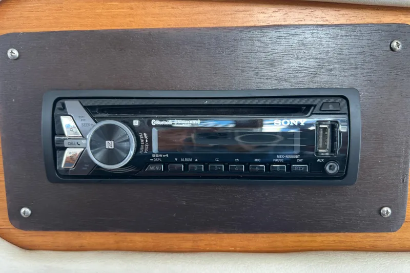 Slide: The Image of Sony stereo system in a 1996 Riviera 4800 Sport Yacht dashboard. - 27