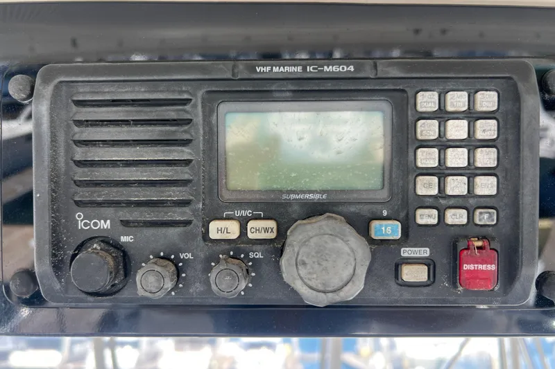 Slide: The Image of VHF marine radio IC-M604 on 1996 Riviera 4800 Sport Yacht dashboard. - 39