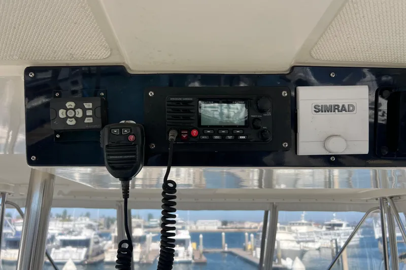 Slide: The Image of Control panel of a 1996 Riviera 4800 Sport Yacht with marine electronics. - 43