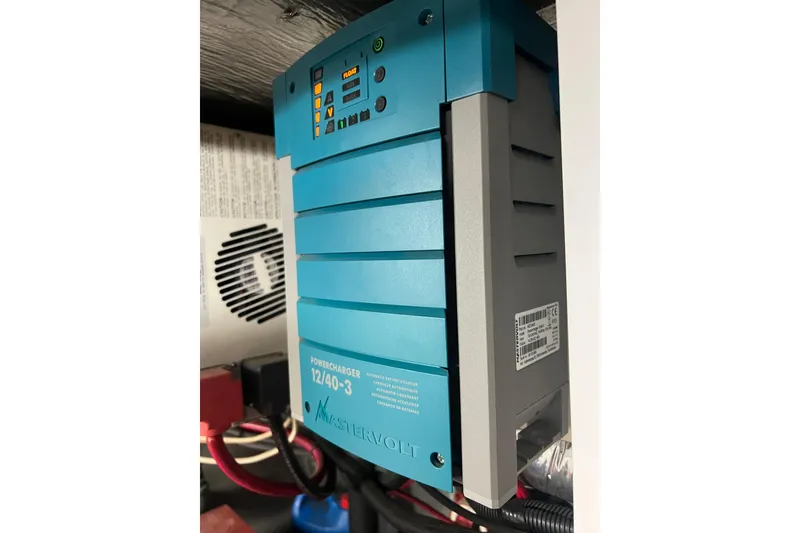 Slide: The Image of Mastervolt PowerCharger 12/40-3 installed on a 1996 Riviera 4800 Sport Yacht. - 59