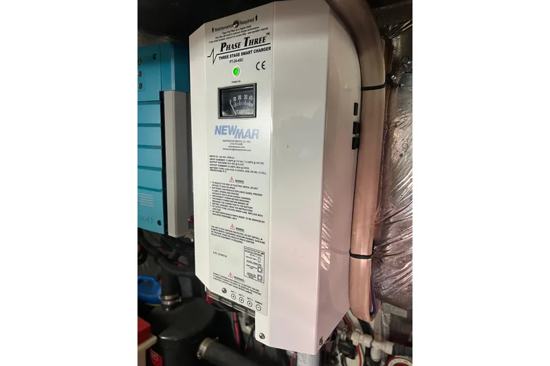 Slide: The Image of Newmar Phase Three smart charger in 1996 Riviera 4800 Sport Yacht engine room. - 60