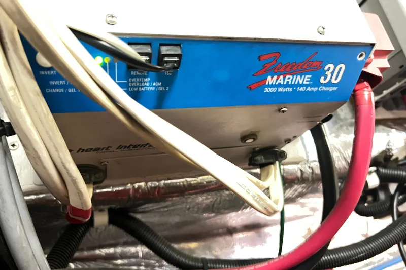 Slide: The Image of Freedom Marine 30 charger in 1996 Riviera 4800 Sport Yacht engine room. - 66