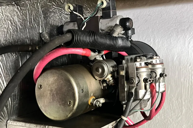 Slide: The Image of Close-up of mechanical components in a 1996 Riviera 4800 Sport Yacht engine compartment. - 83