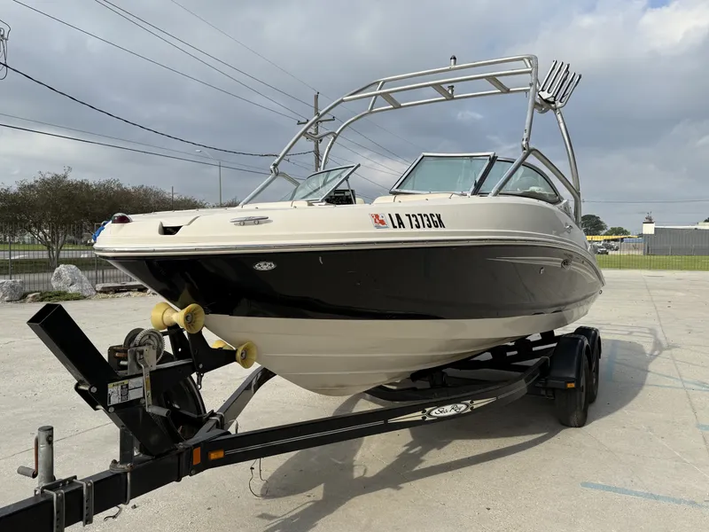 Slide: The Image of 2007 Sea Ray 210 boat on trailer, side view. - 11
