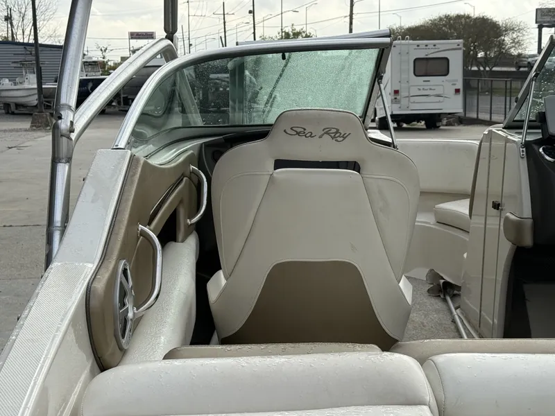 Slide: The Image of Interior view of a 2007 Sea Ray 210 boat with wet seats. - 13
