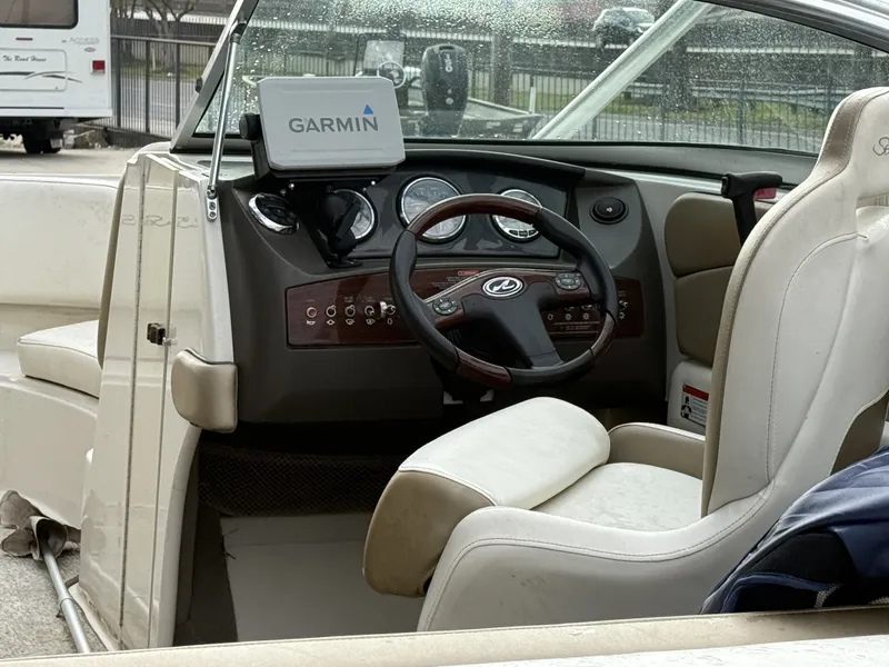 Slide: The Image of Interior of a 2007 Sea Ray 210 boat with Garmin navigation system. - 8