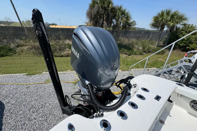 Slide: The Image of 2025 BlackJack 256 Coastal boat with Yamaha outboard motor and Power-Pole anchor system. - 36
