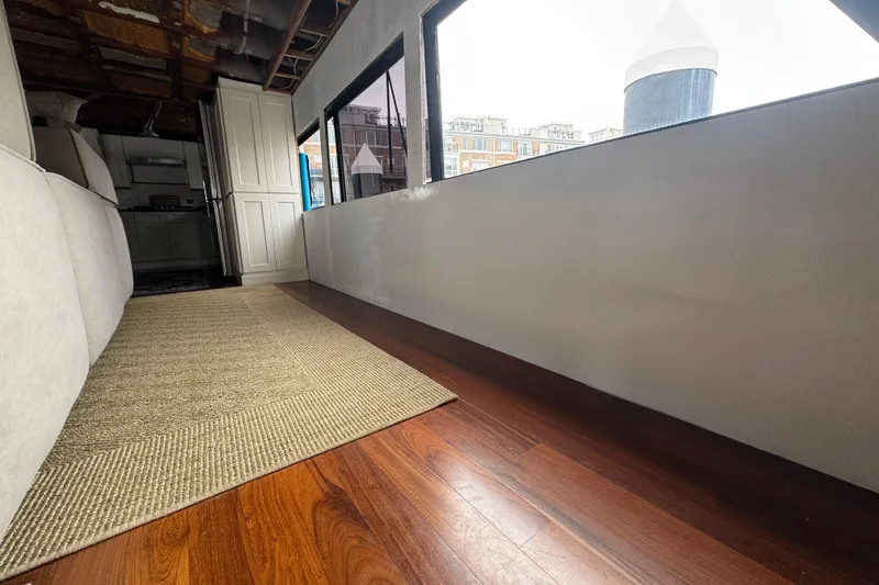 Slide: The Image of Luxurious kitchen interior of 1997 Tarrab 77 Motor Yacht with modern appliances and seating area. - 11