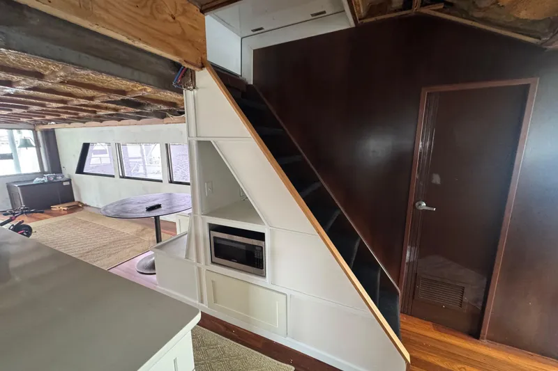 Slide: The Image of Interior of 1997 Tarrab 77 Motor Yacht bathroom with sink and window view. - 18