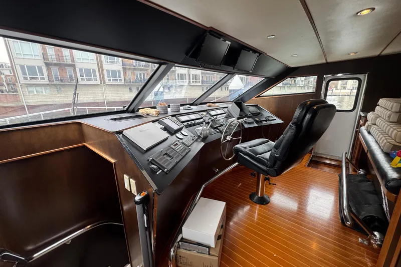 Slide: The Image of Cockpit of 1997 Tarrab 77 Motor Yacht with navigation equipment and leather captain's chair. - 22
