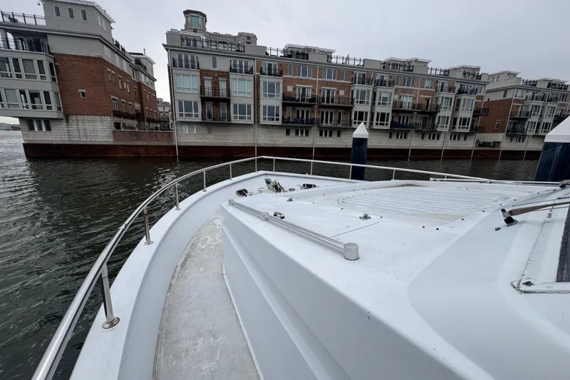 Slide: The Image of Bow of 1997 Tarrab 77 Motor Yacht with anchor chain and cleats. - 30