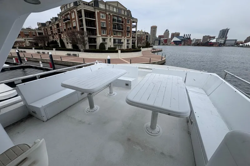 Slide: The Image of Tarrab 77 Motor Yacht (1997) docked in urban waterfront setting. - 41