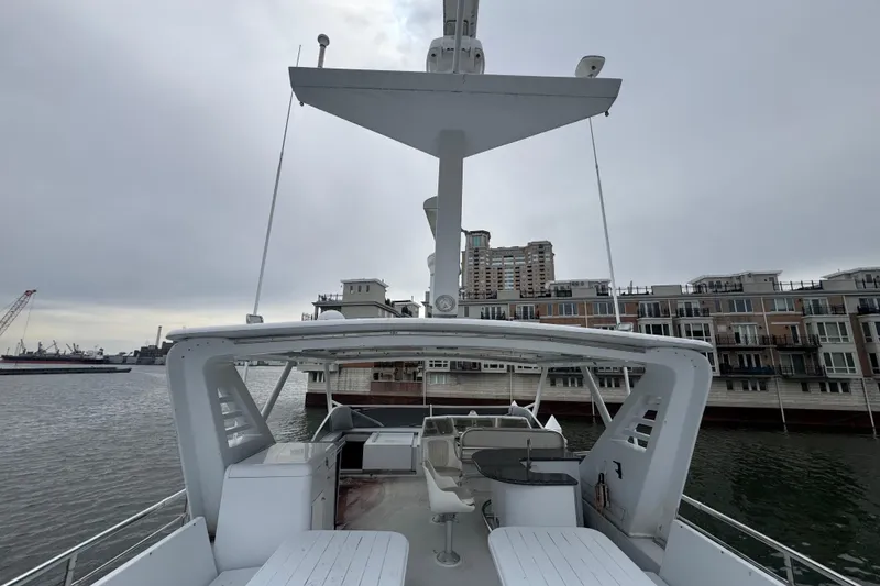 Slide: The Image of Staircase inside 1997 Tarrab 77 Motor Yacht with wooden walls and carpeted steps. - 43