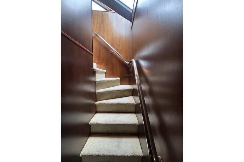 Slide: The Image of Luxurious bedroom interior of 1997 Tarrab 77 Motor Yacht with elegant bedding and ambient lighting. - 45